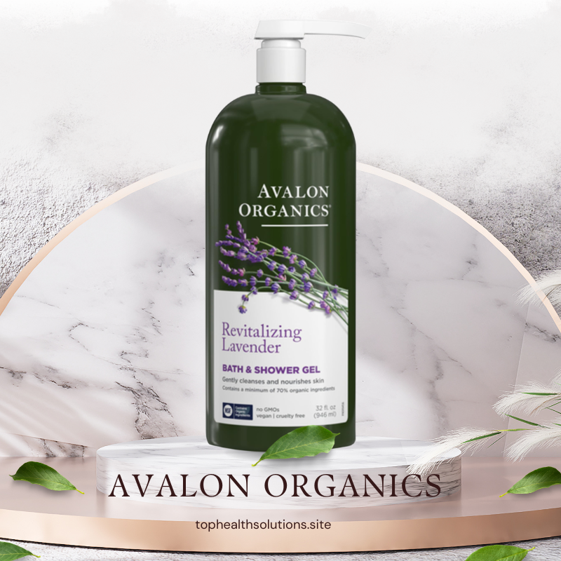 Avalon Organics Revitalizing Lavender Bath and Shower Gel displayed on a marble pedestal with green leaves and spa-inspired decor, featured among the best organic body washes.