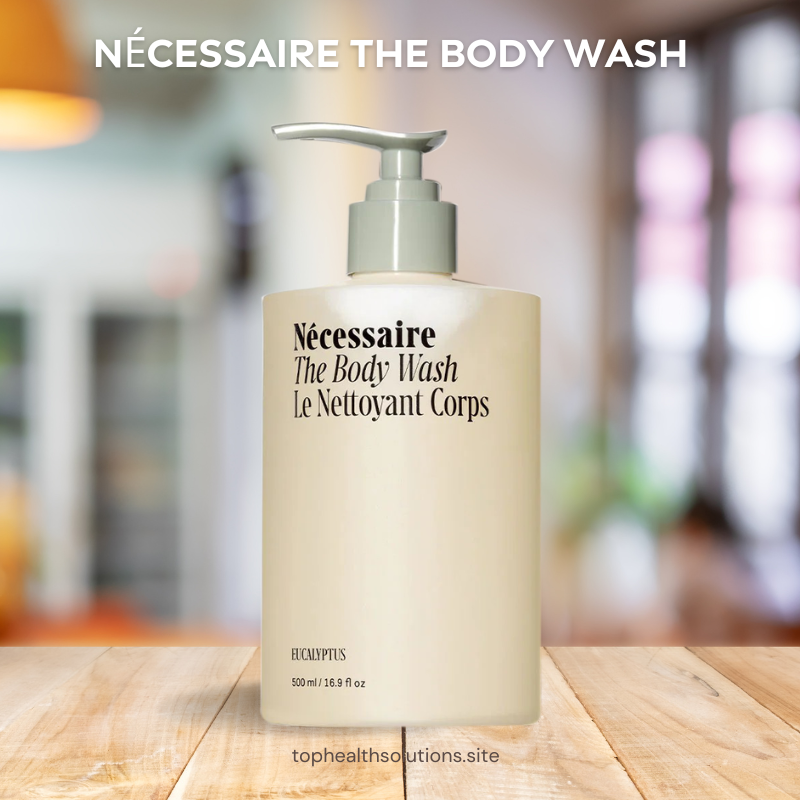Necessaire The Body Wash Eucalyptus pump bottle on a wooden surface with soft minimalist lighting, featured among the best organic body washes for modern skincare routines.