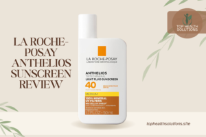 La Roche-Posay Anthelios Tinted Mineral Light Fluid Sunscreen SPF 40 bottle with review text on a beige background.