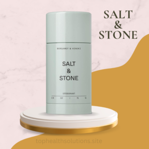 Salt & Stone aluminum-free deodorant stick displayed on a white pedestal with a modern pastel background, featuring minimalist packaging and a premium skincare aesthetic.